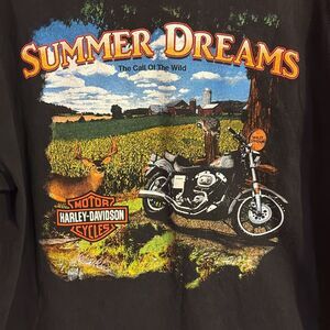 Vintage black Harley Davidson T-shirt with vibrant, graphic design. Sz XL.